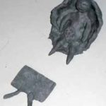 Figure 3. A child’s clay model demonstrates how her life used to be.