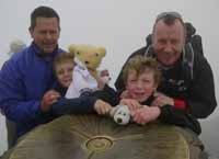 Genny and fund-raisers top one of the three peaks.