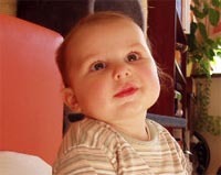 Signs of autism may be spotted in babies between four and six months old, researchers suggest.