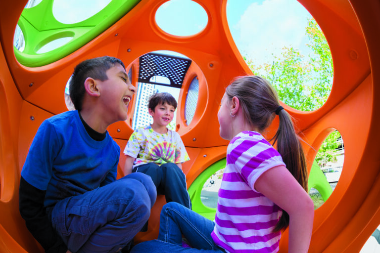 How can inclusive playgrounds support children’s play values and inclusive experiences?